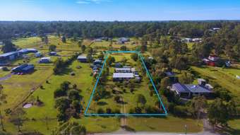 Farm Property for Sale - 35 Linneus Street Owanyilla QLD 4650